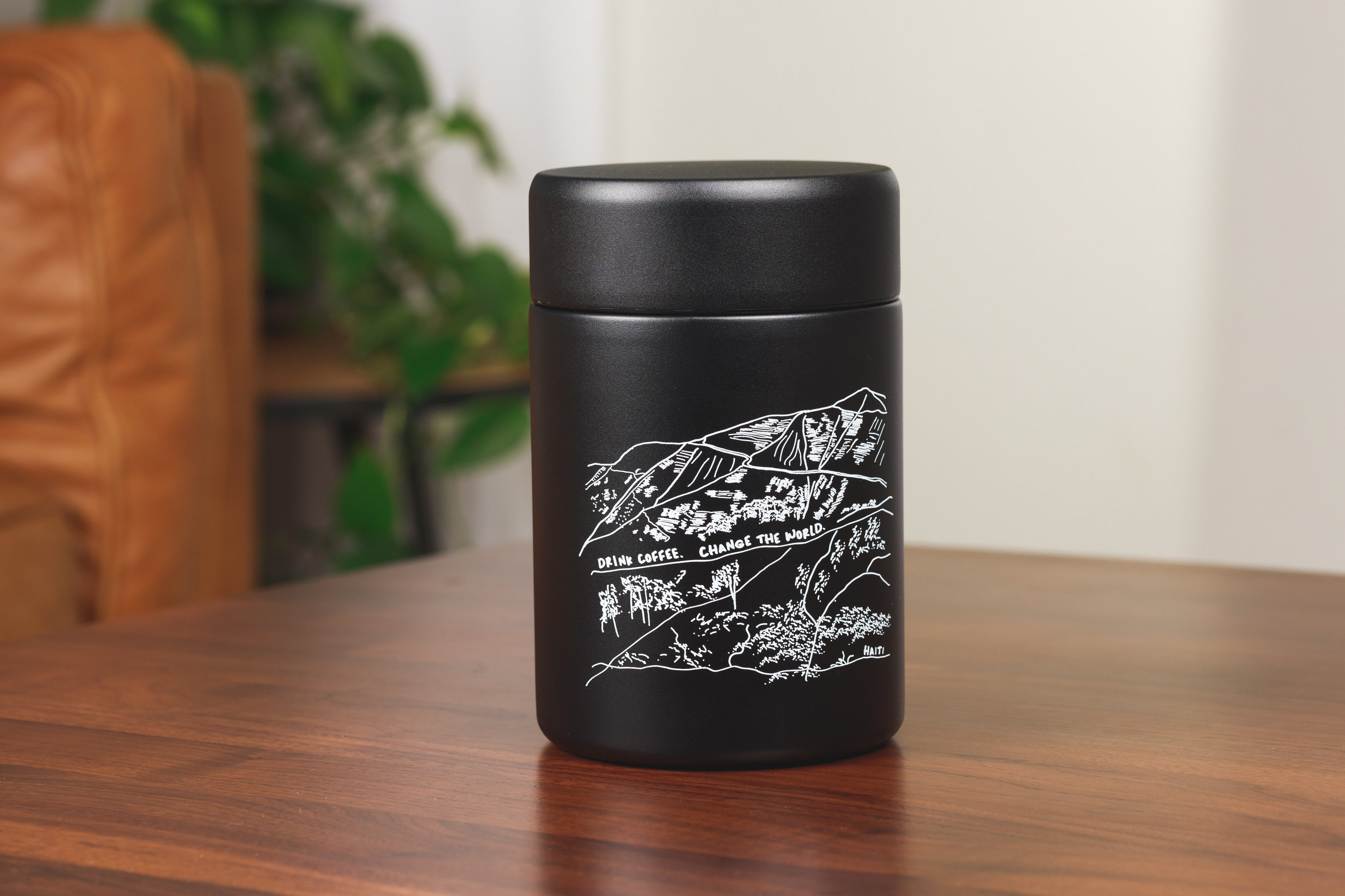 Drink Coffee. Change the world. Coffee Canister